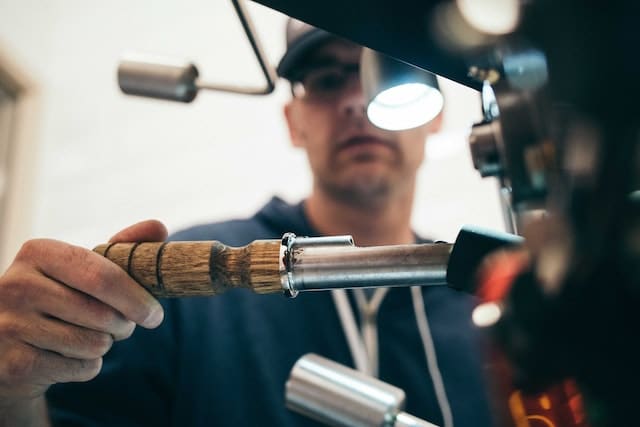 A plumber fixing a valve