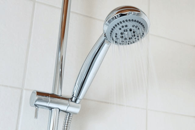 how to clean a shower head