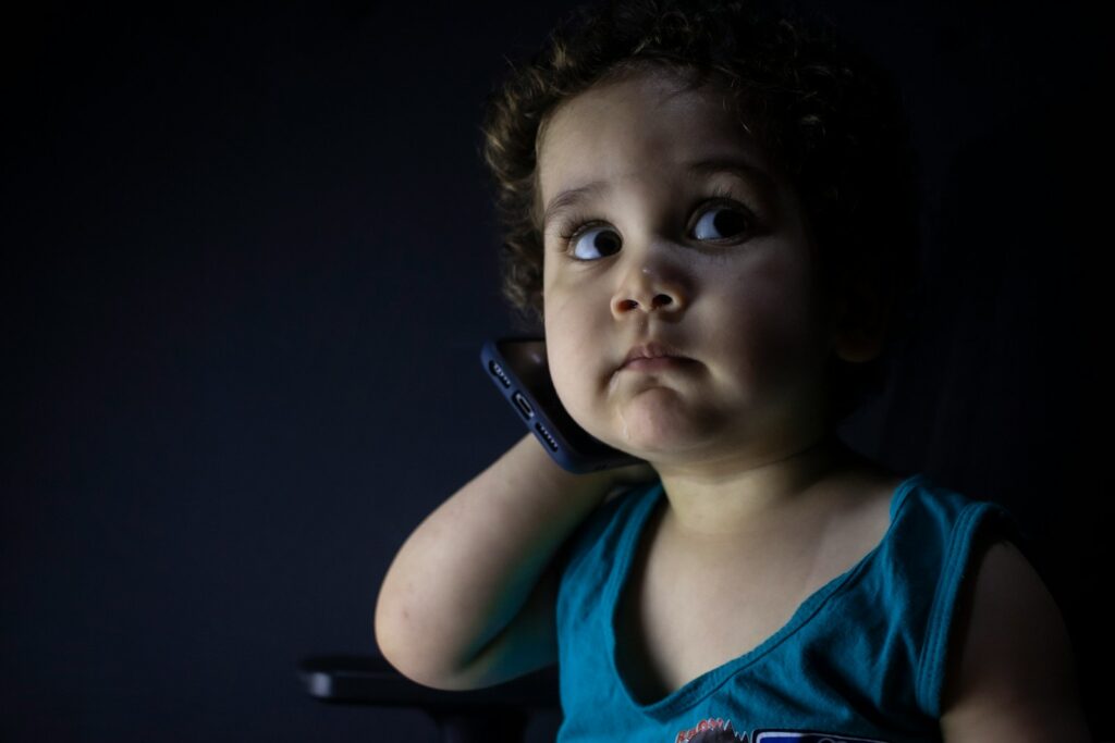 boy in blue tank top