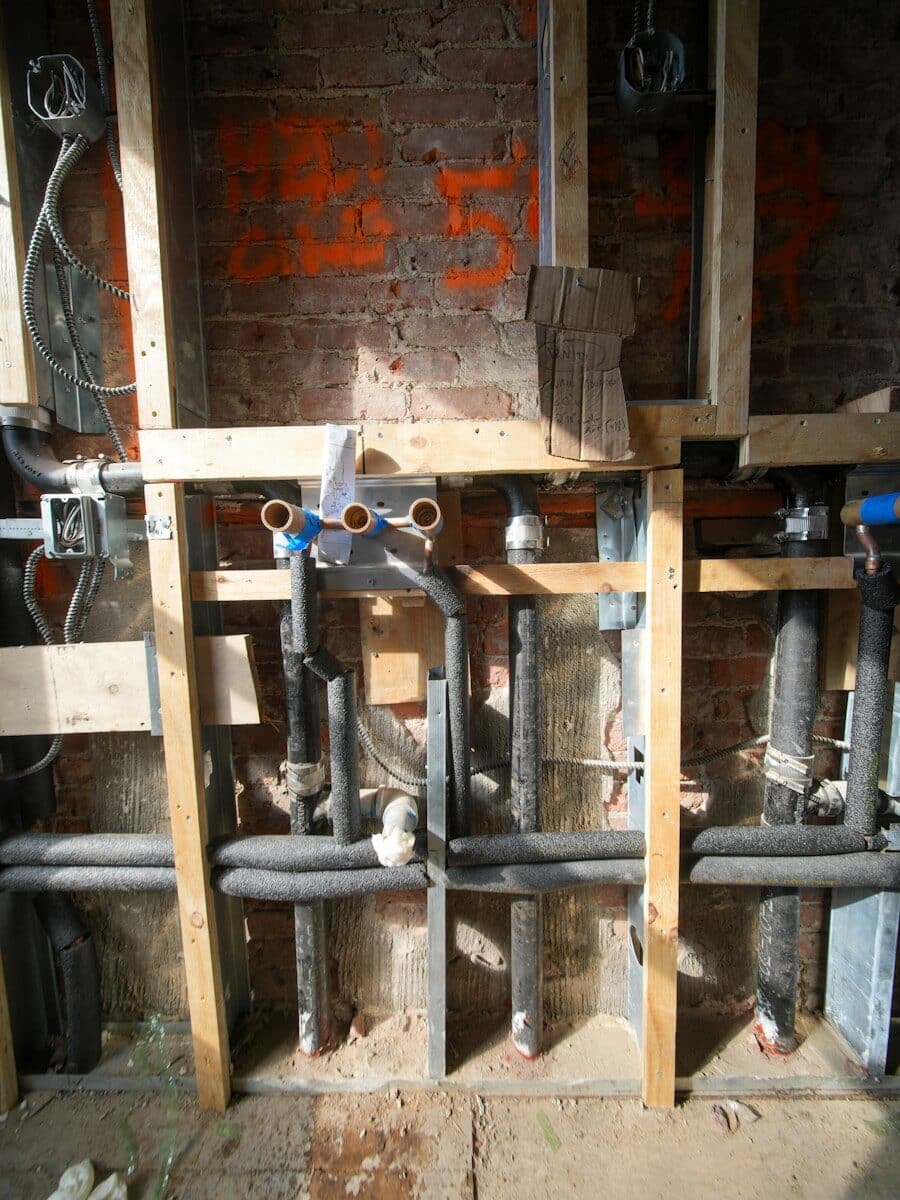 Photo by Olek Buzunov rough in plumbing
